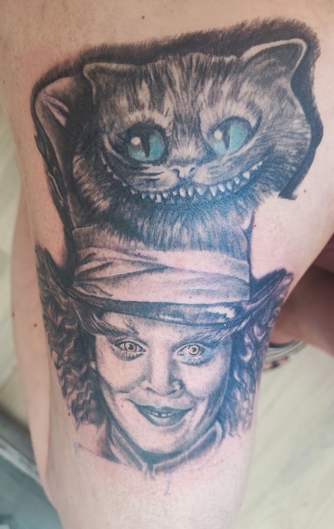 a narben tattoo of a cat and a woman, börde, germany