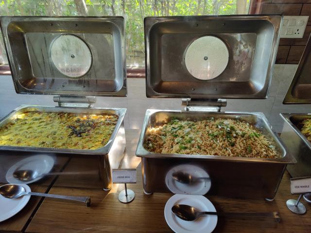 Rice and noodles at the oriental counter of the corporate buffet — multi-cuisine corporate lunch in Gurugram
