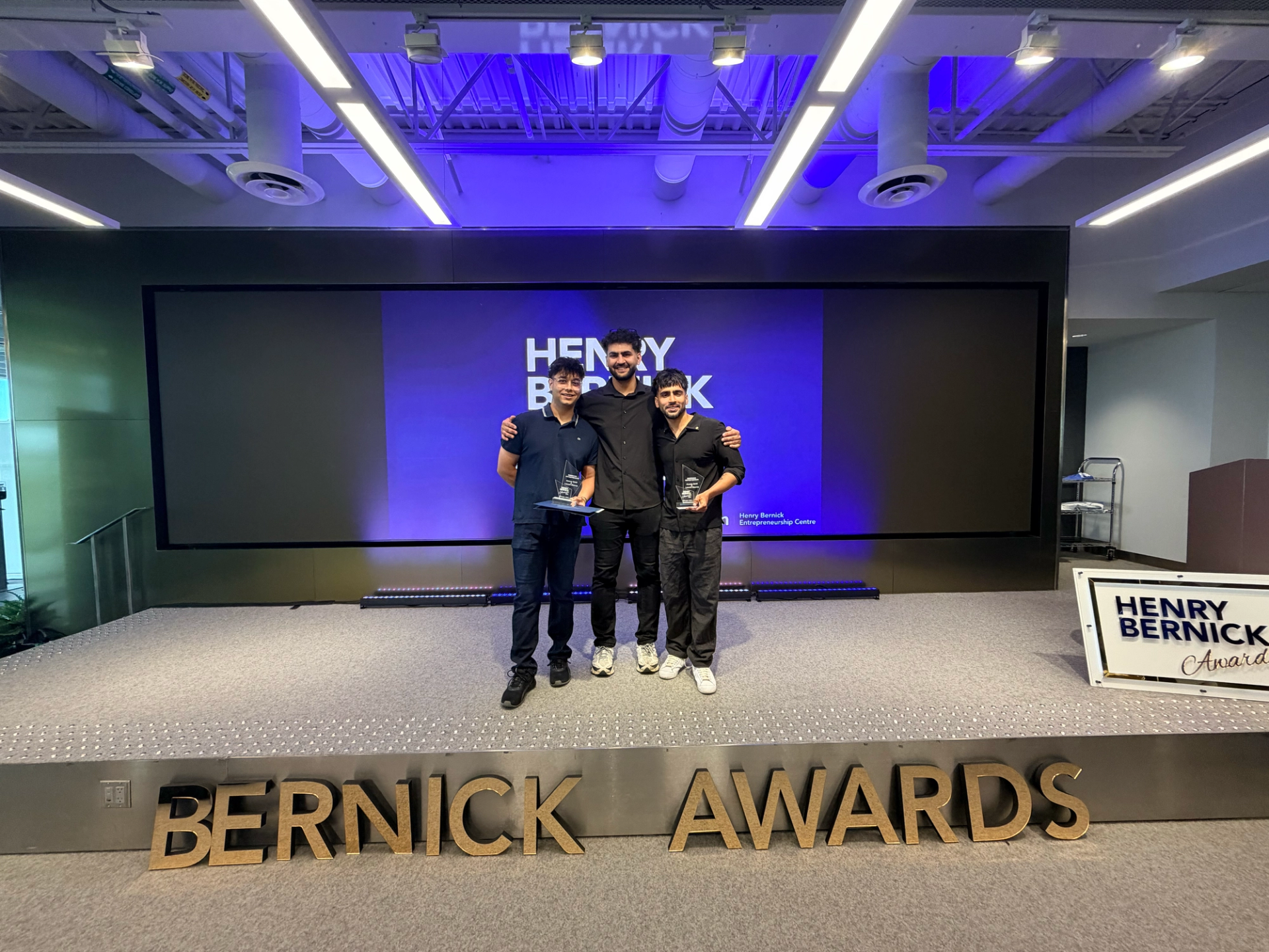 Aasees Sethi and Lakshit Sharma receiving the Emerging Entrepreneur Award at Georgian College's Henry Bernick Awards