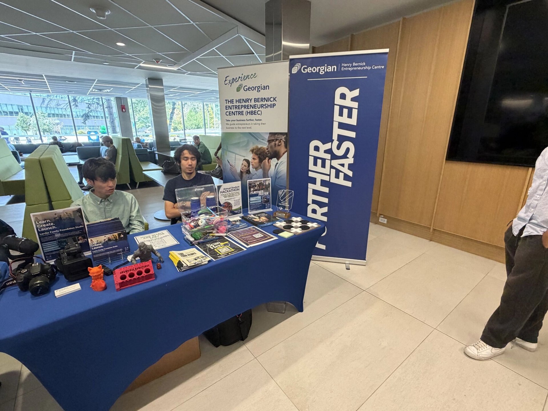 The ImpulsTrip and HBEC table at Georgian College orientation day in Barrie