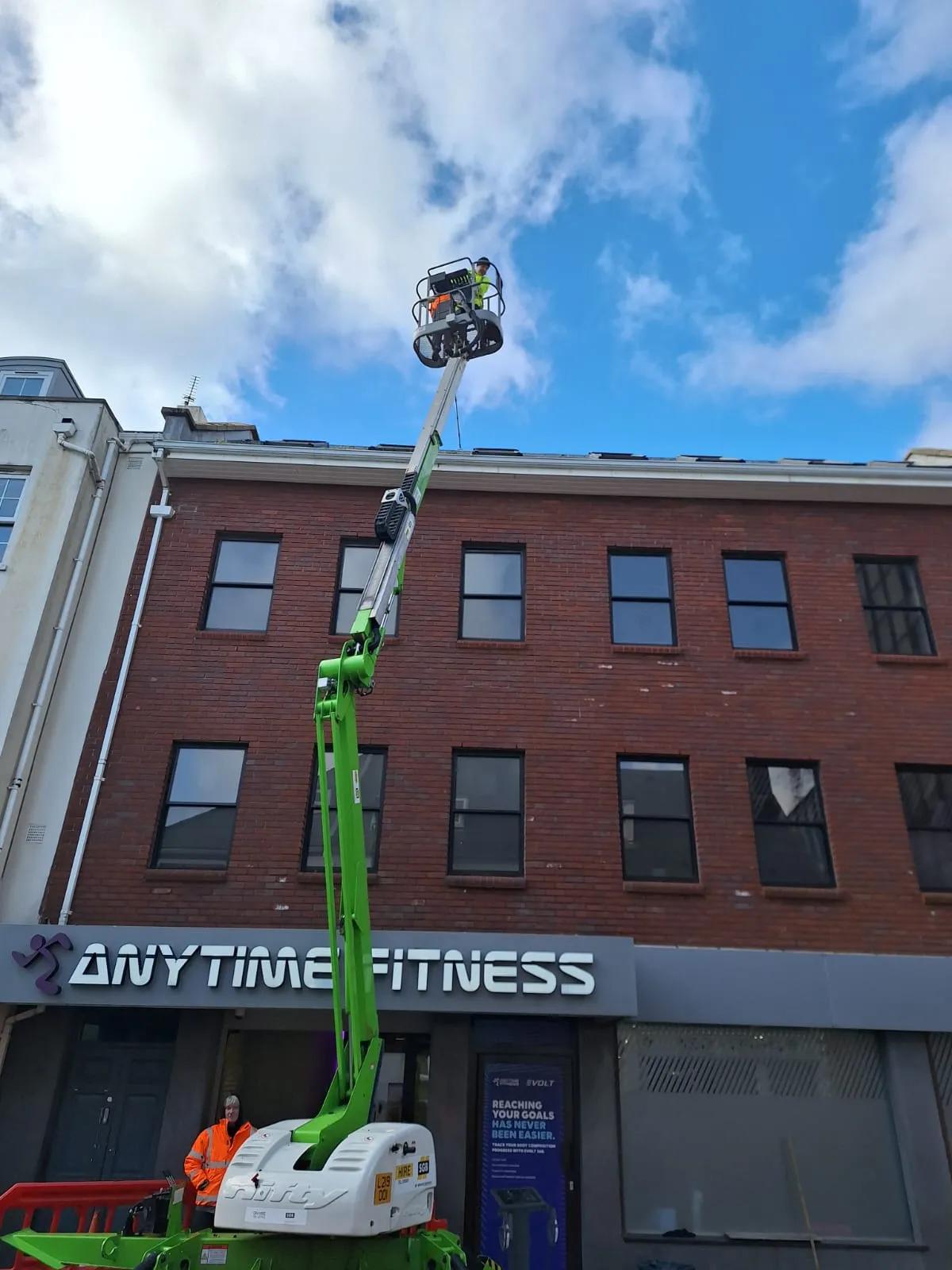 Cherry picker cleaning anytime fitness