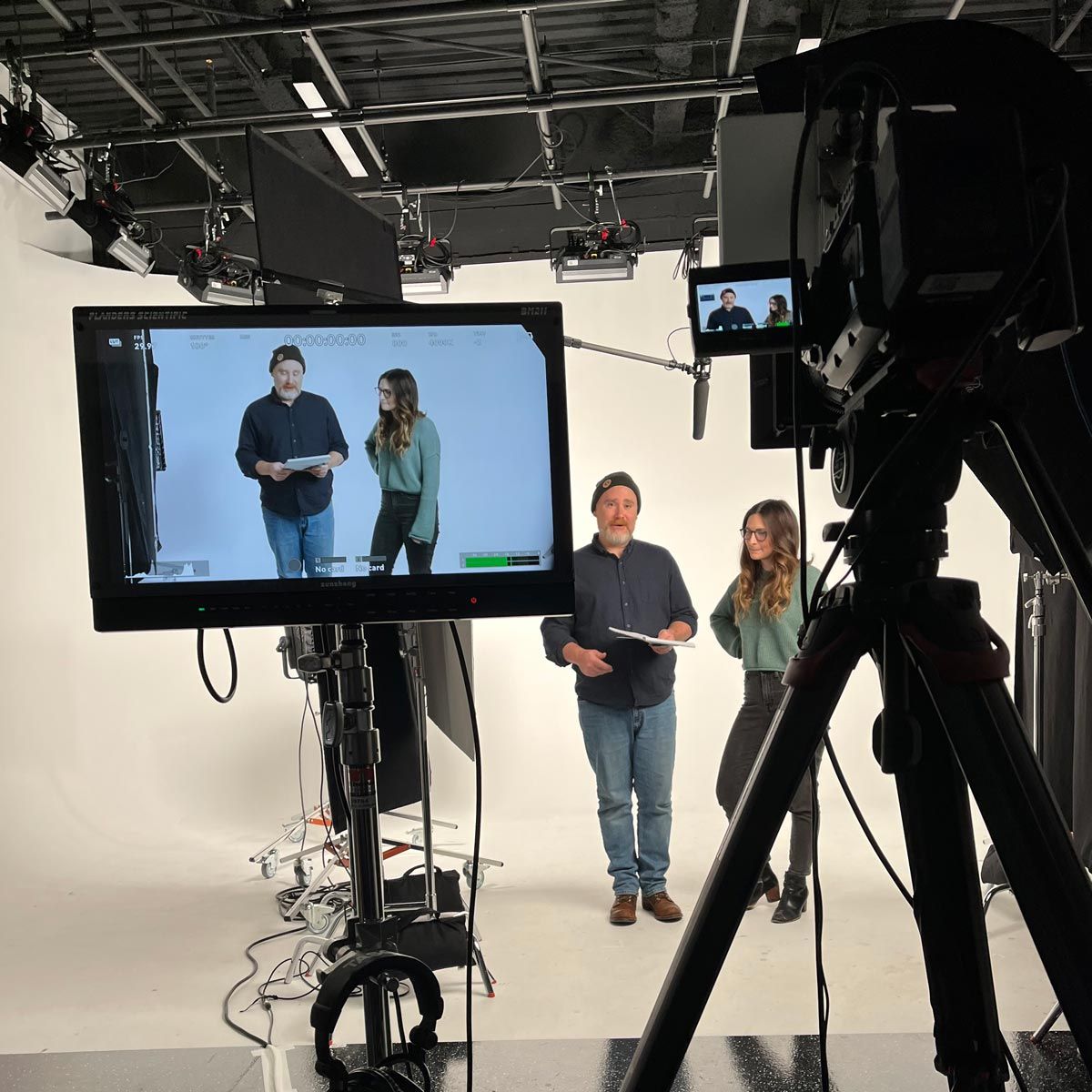 Photograph of Gammut filming P+N employees for a video.