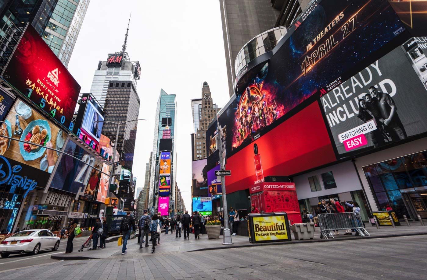 Photograph of numerous advertisements in a city.