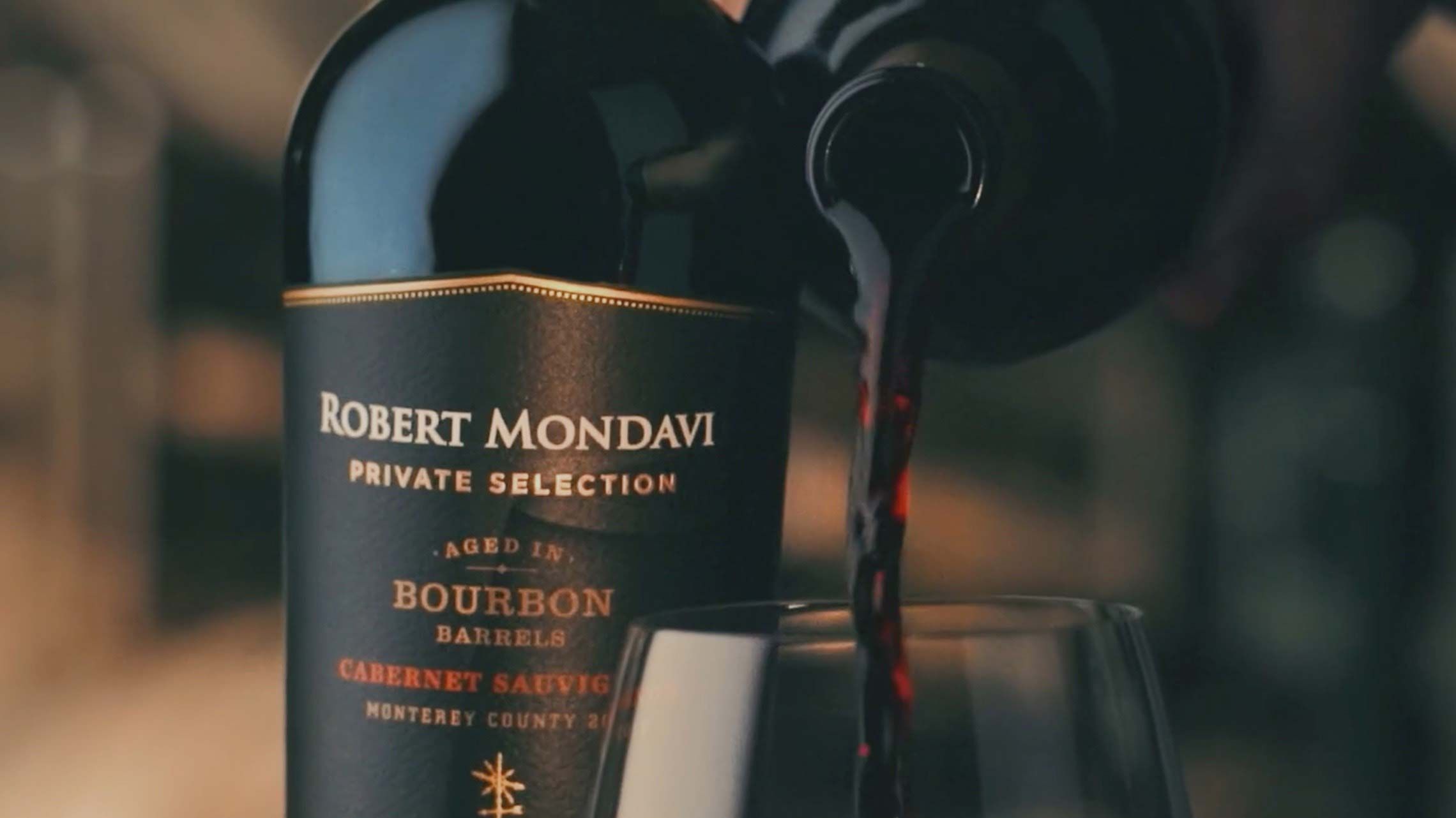 Picture of wine pouring into a glass.