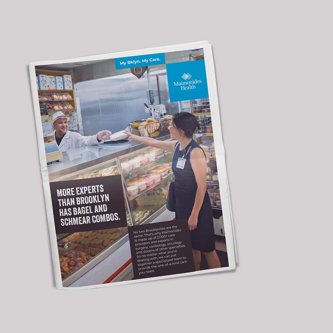 Photograph of Maimonides advertisement in a magazine that says, "More experts than Brooklyn has bagel and schmear combos."