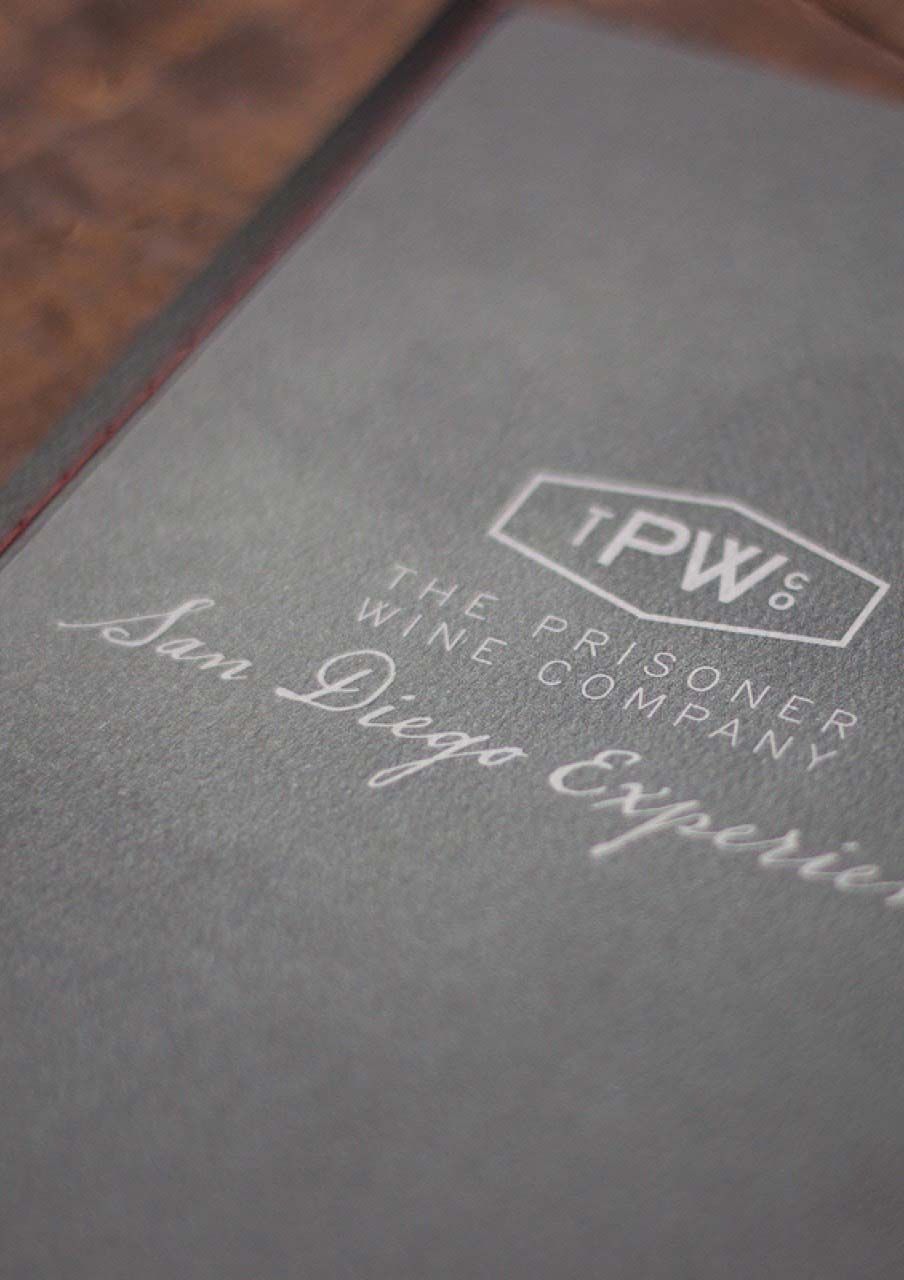 Photograph of event collateral showing the inside of the leather packet.