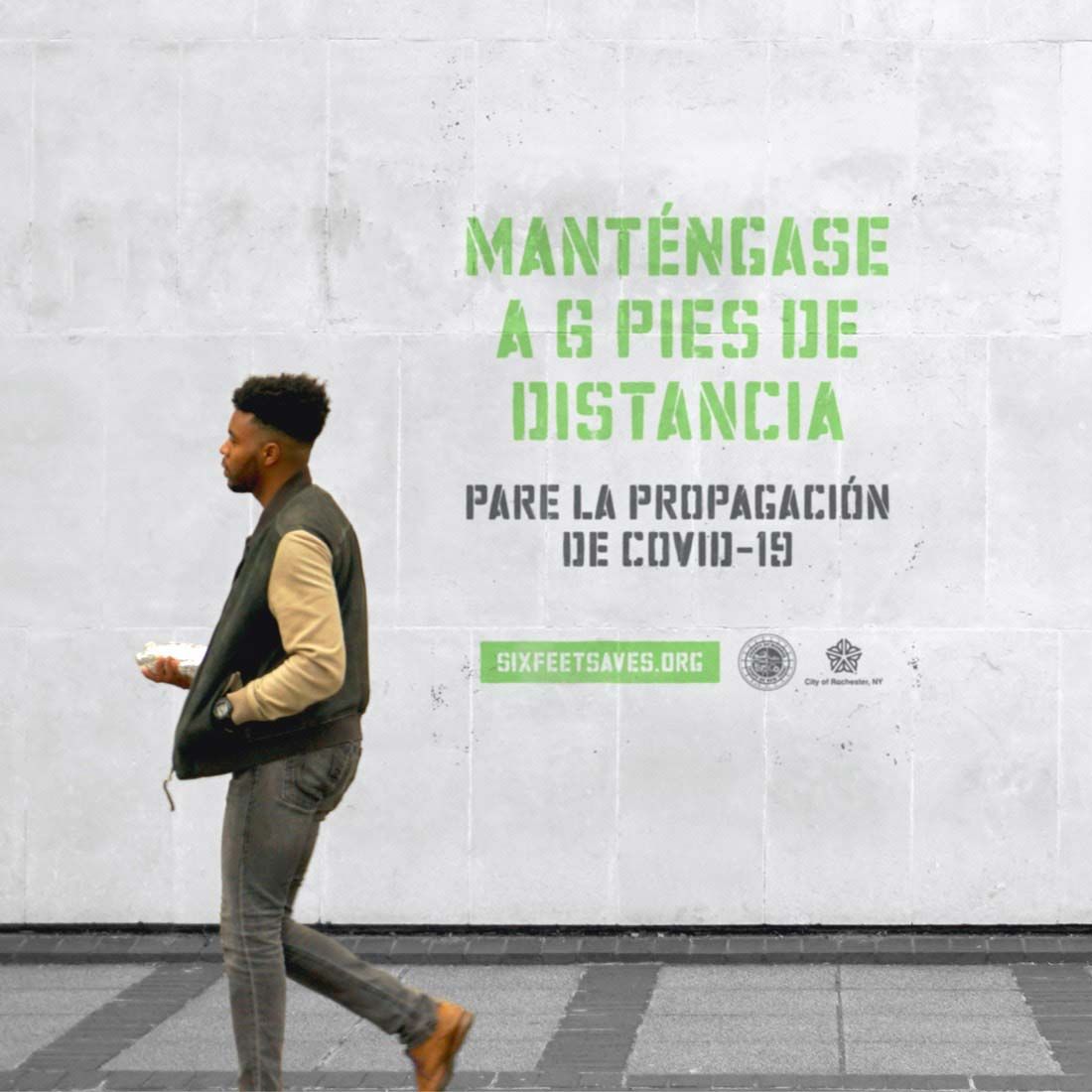 Photograph of Six Feet Saves messaging in Spanish that says, "Manténgase a seis pies de distancia."
