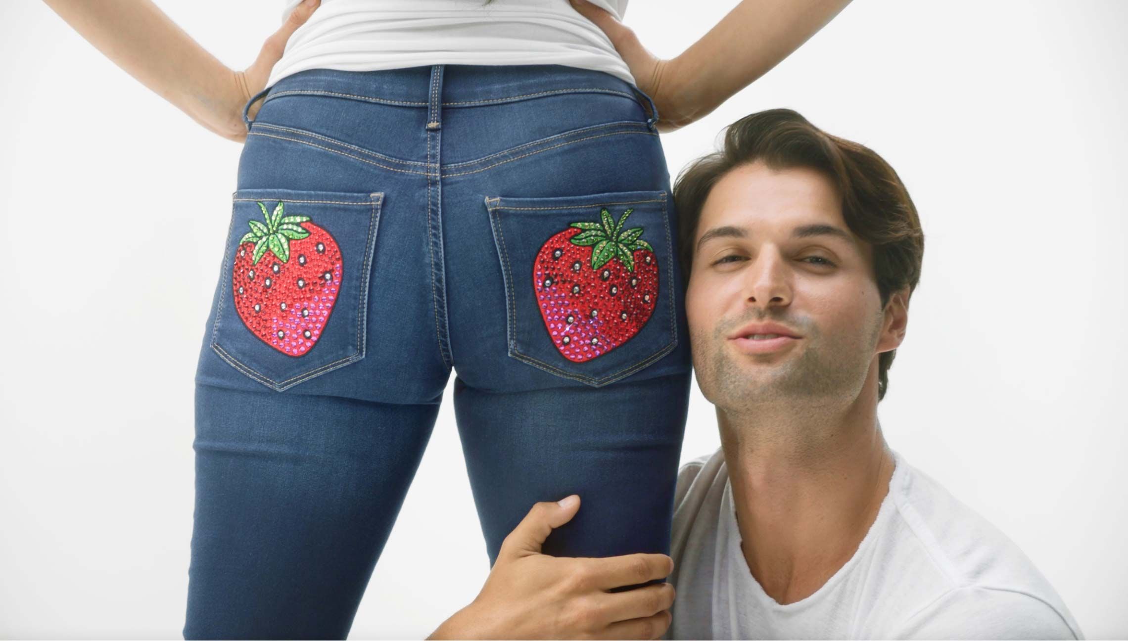 Photograph of a girl with strawberries bedazzled on the butt of her jeans. Click to view one of the television advertisements
