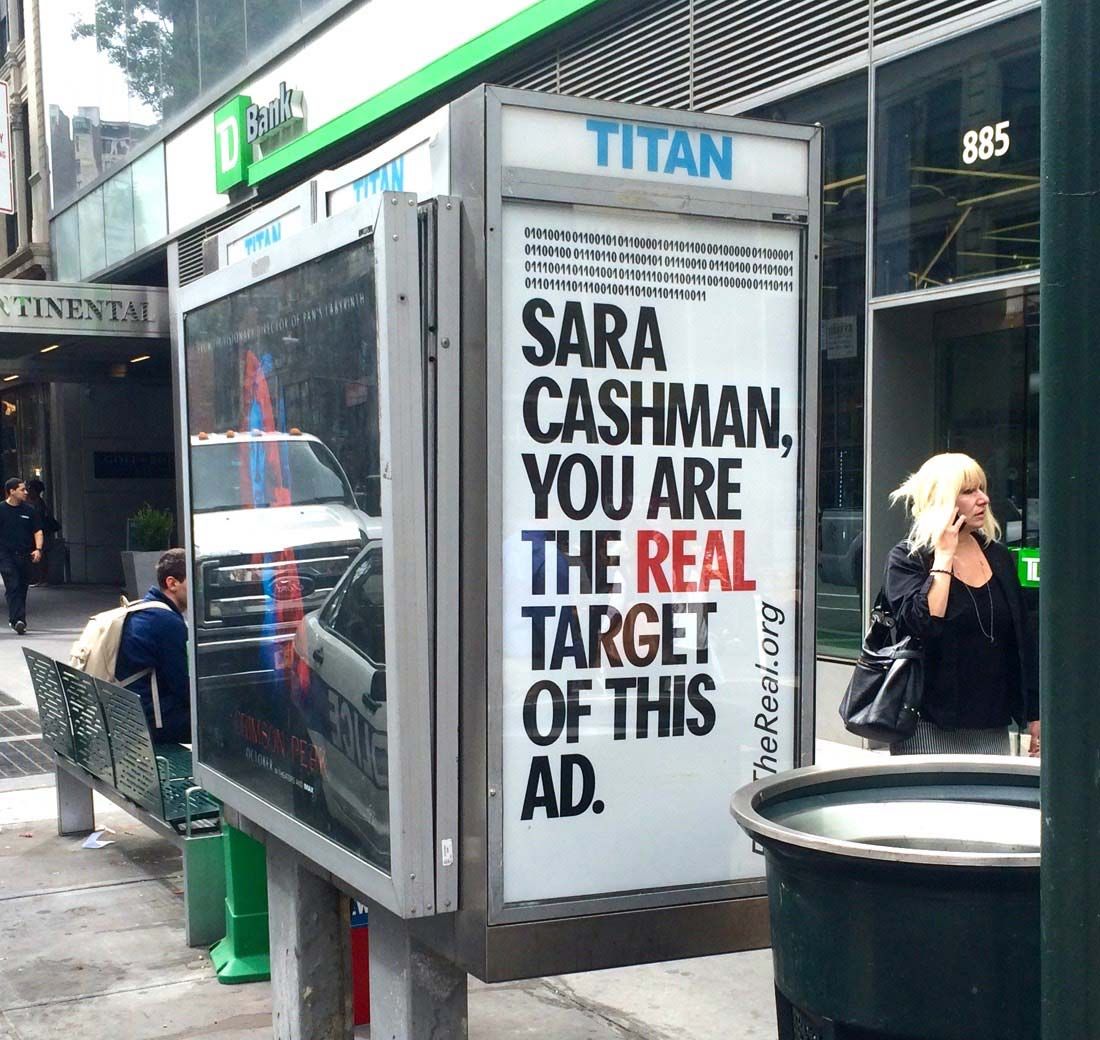 Bus stop ad - "Sara Cashman, you are the real target of this ad."