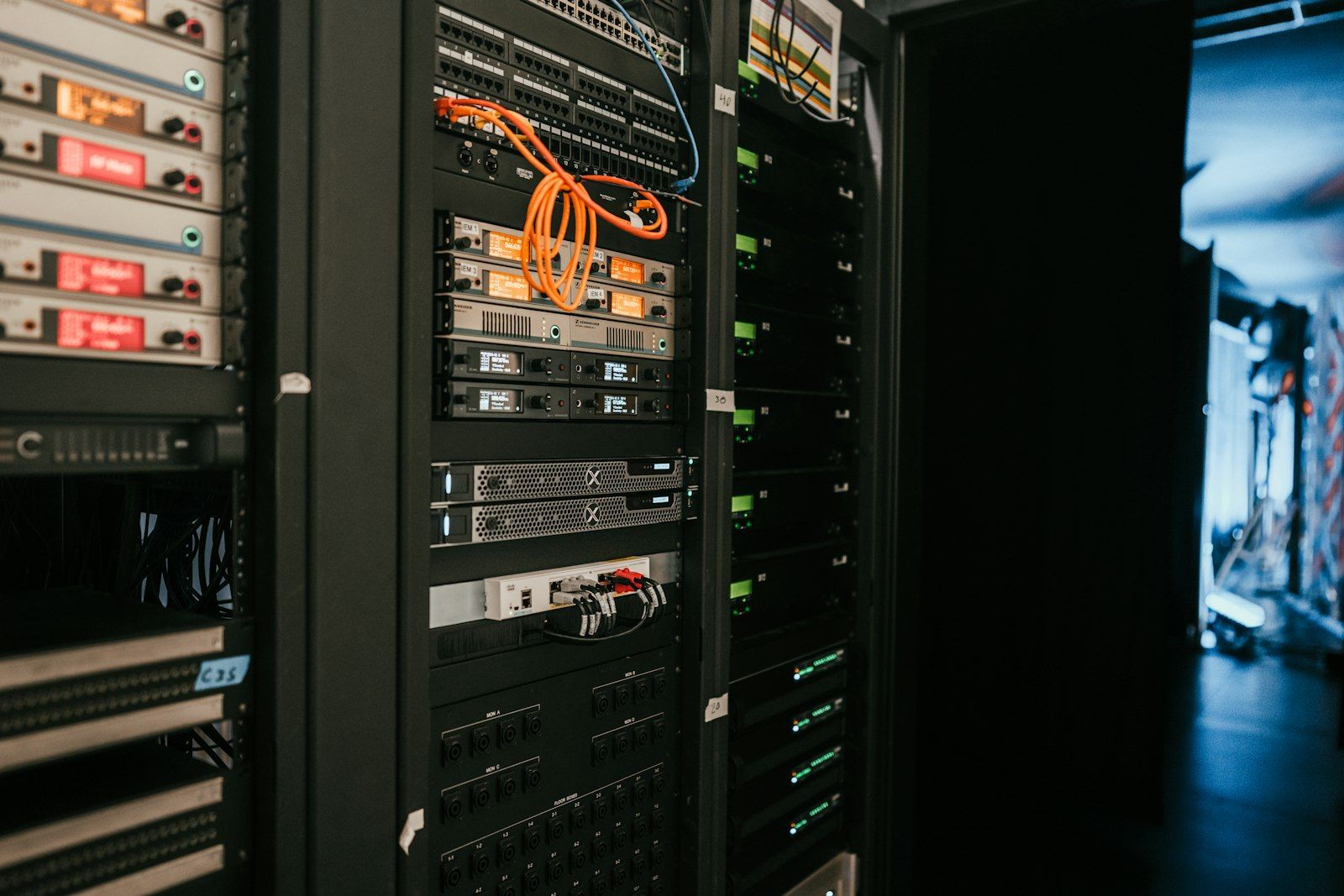 Server racks in a data centre aisle
