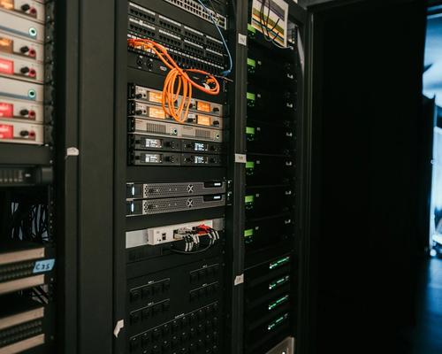 Server racks in a data centre aisle