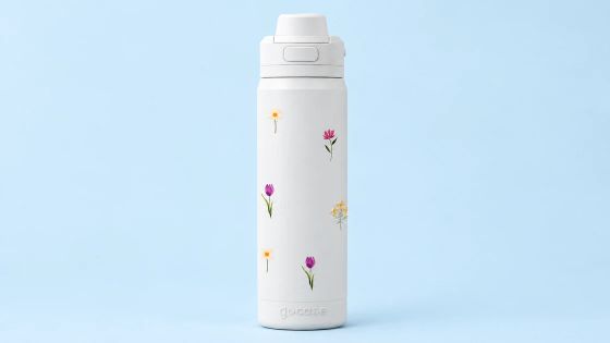 Garrafa Flip Pro branca com estampa de margaridas e tulipas