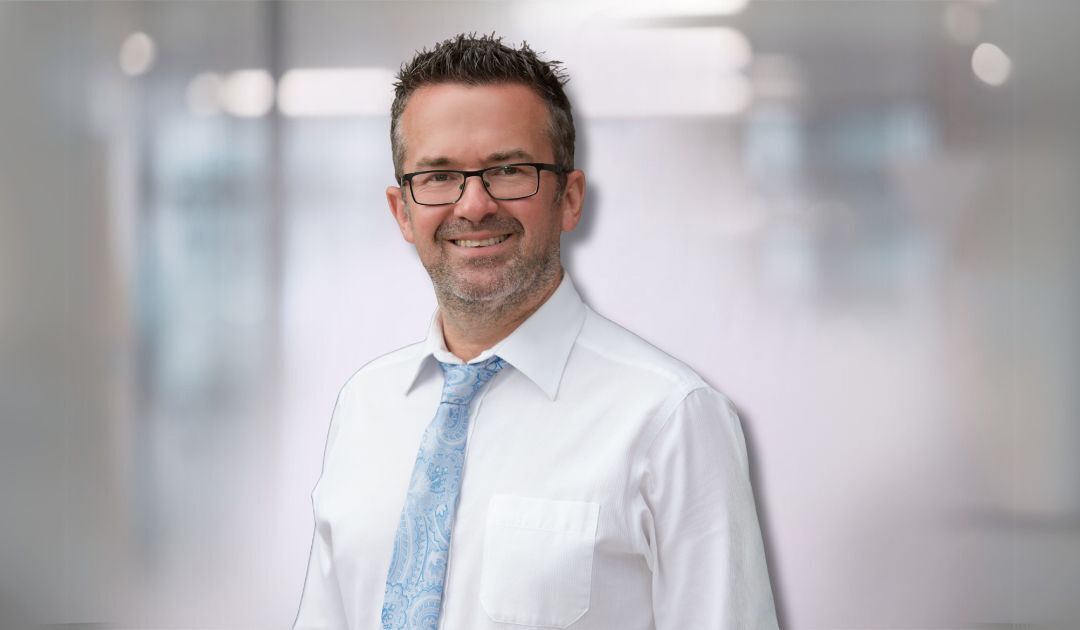 Headshot of Ian Biddington