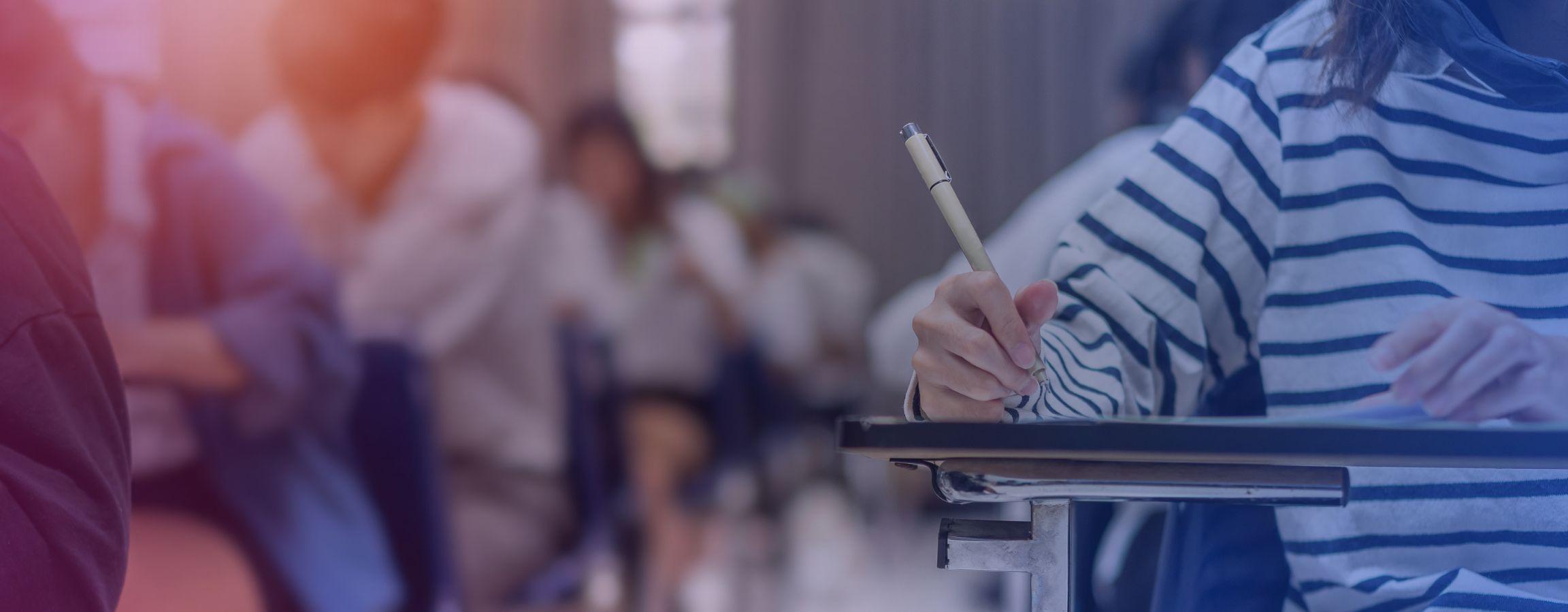 Stock image of students taking an exam
