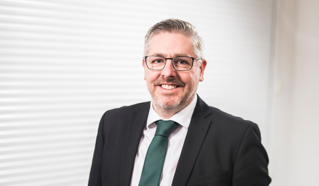 A headshot of Noel Hankinson