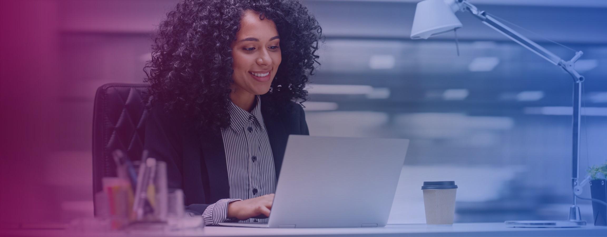 An employee working on their laptop
