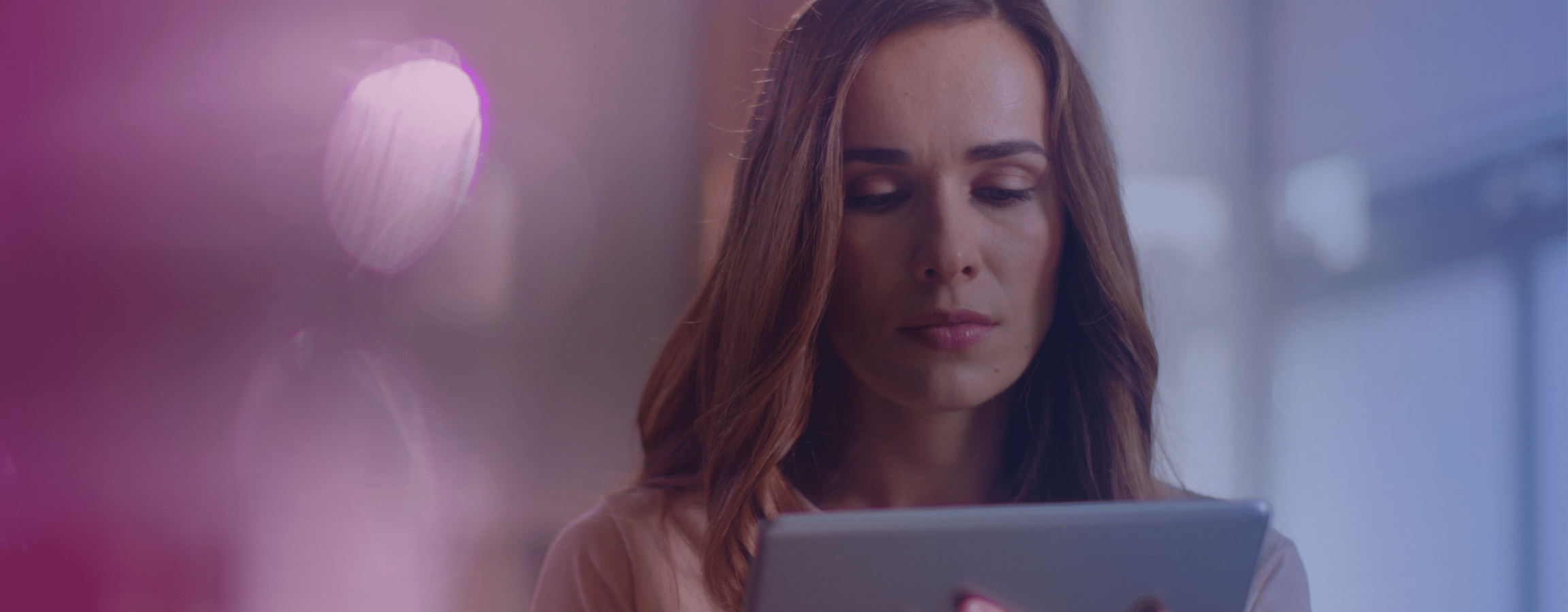 woman holding a tablet