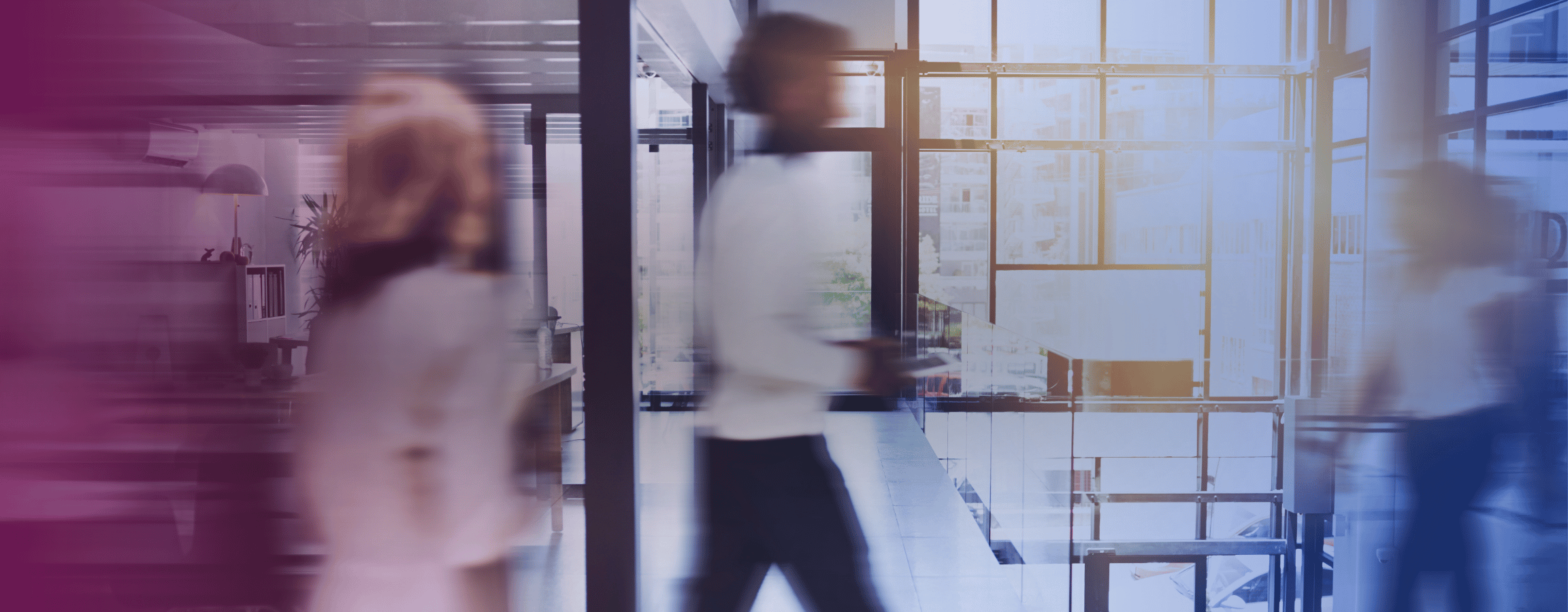 people walking in an office