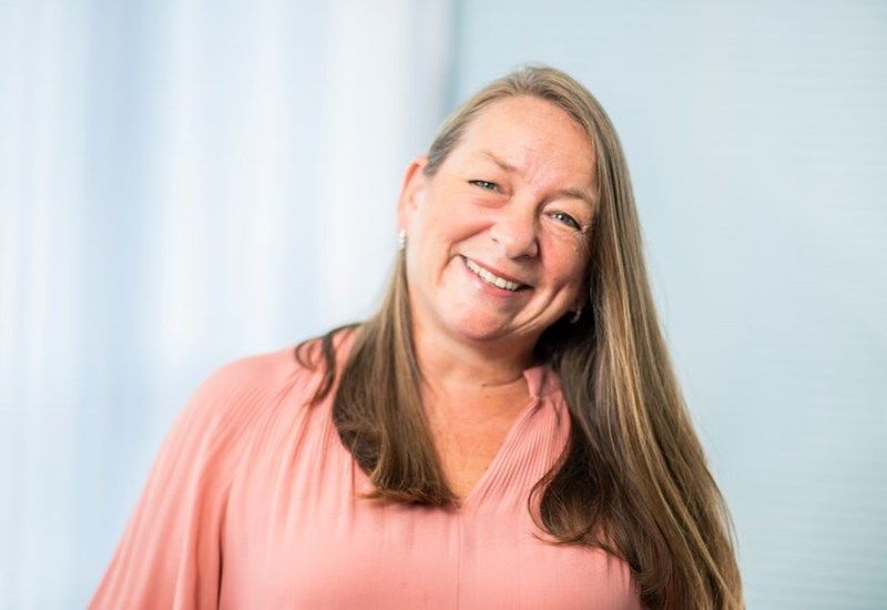 A headshot of Julie Flintoff
