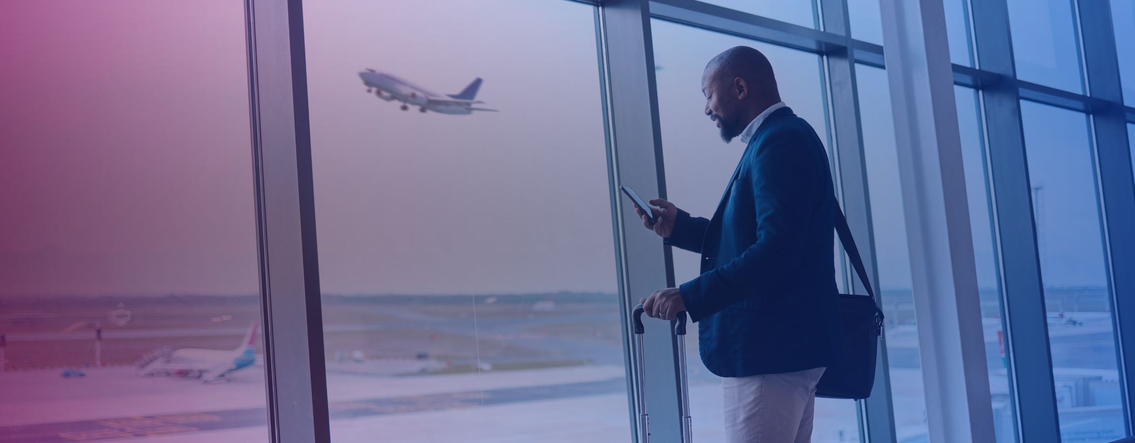 stock image of businessman waiting for a flight
