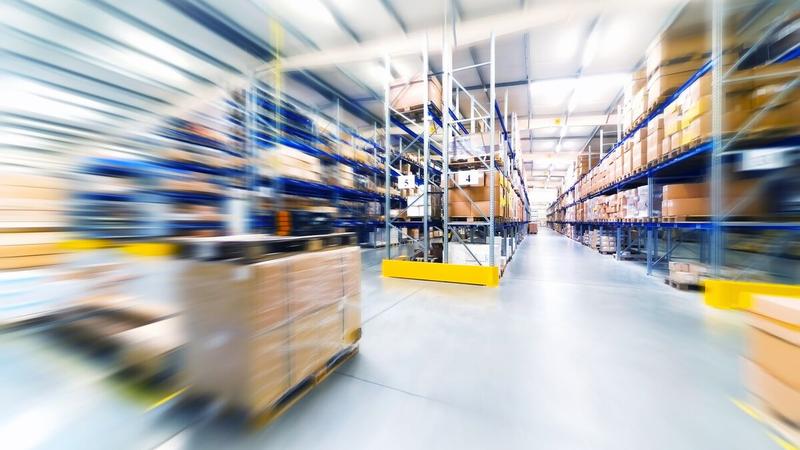 Busy blurry warehouse