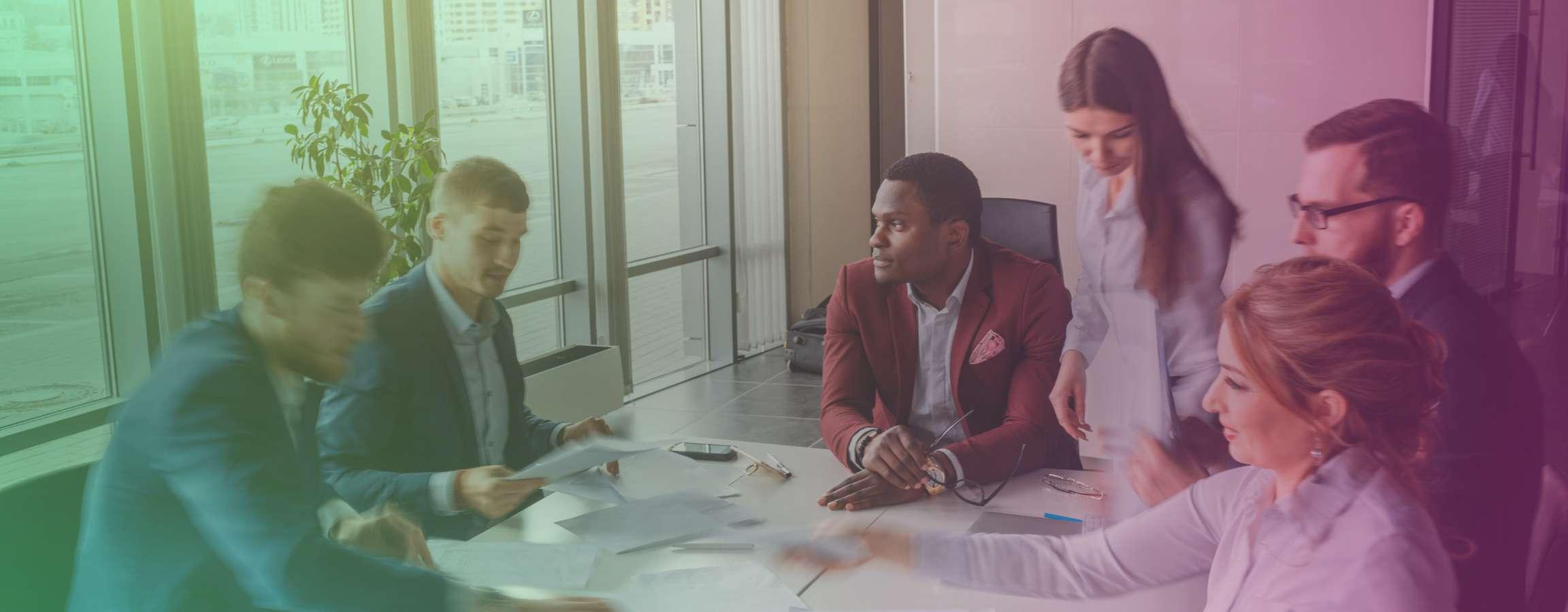 Group of people at a conference table