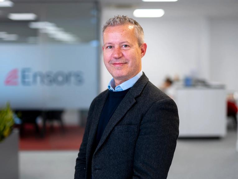 headshot of Mark Hewitson