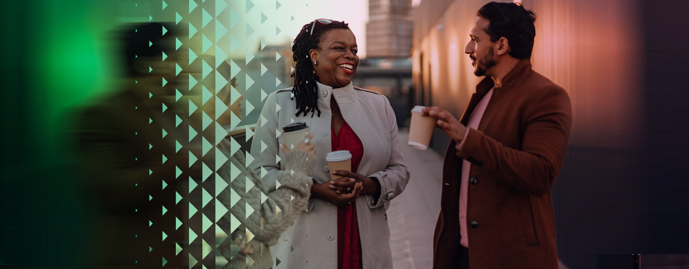People smiling and drinking coffee