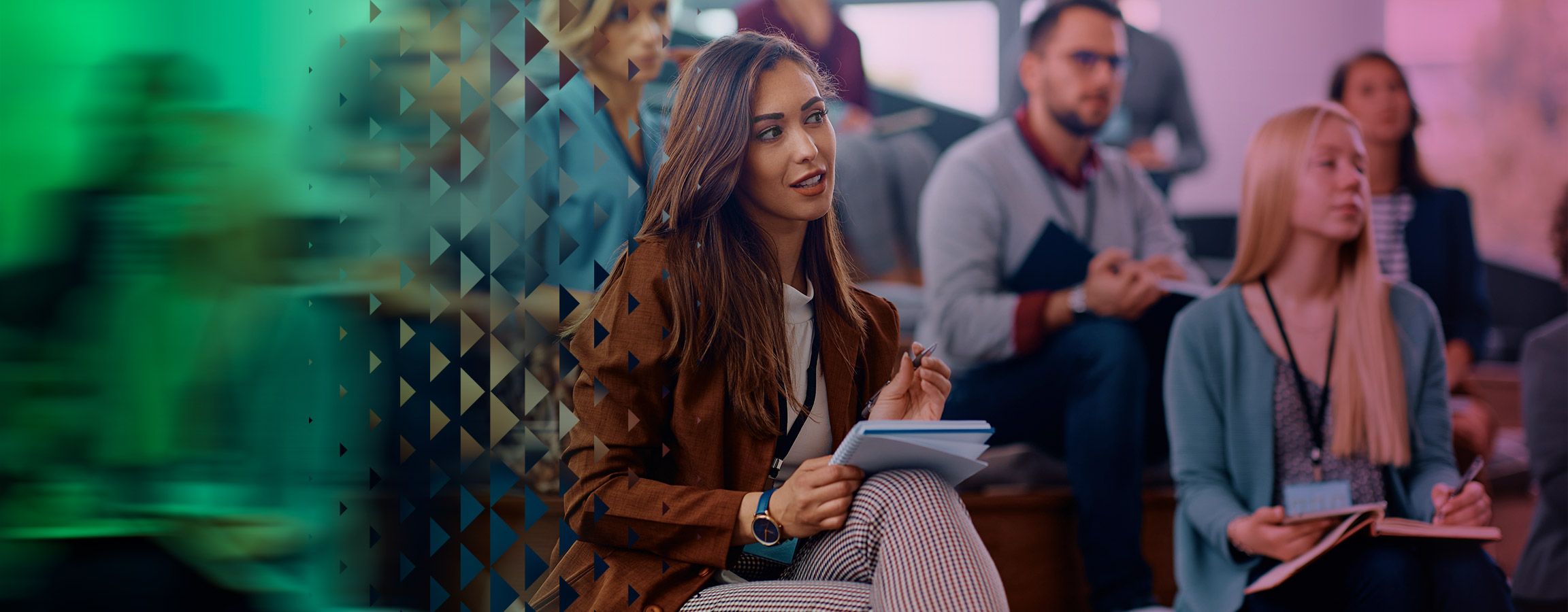 Woman taking notes in a hall