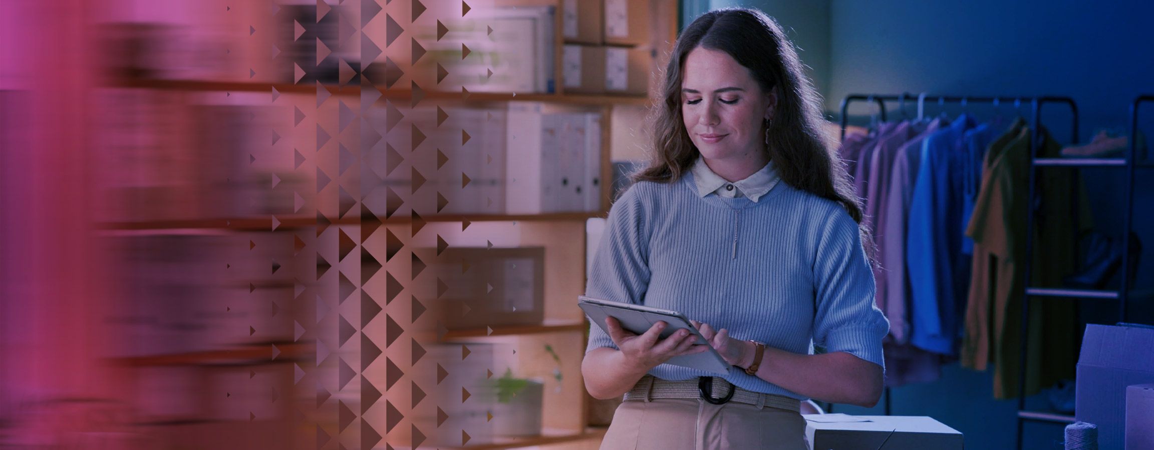 Woman working in a clothes shop