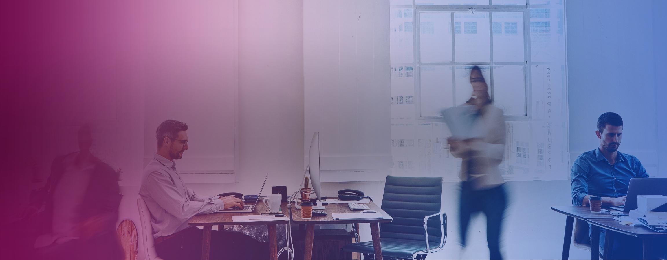 A stock image of people working in an office