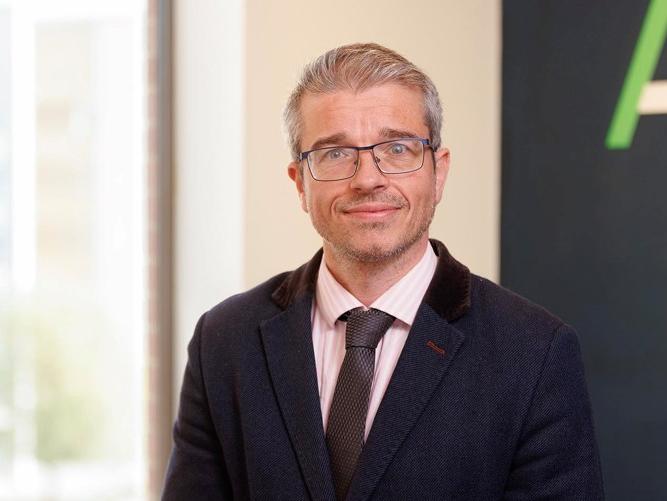 headshot of Simon Stygall