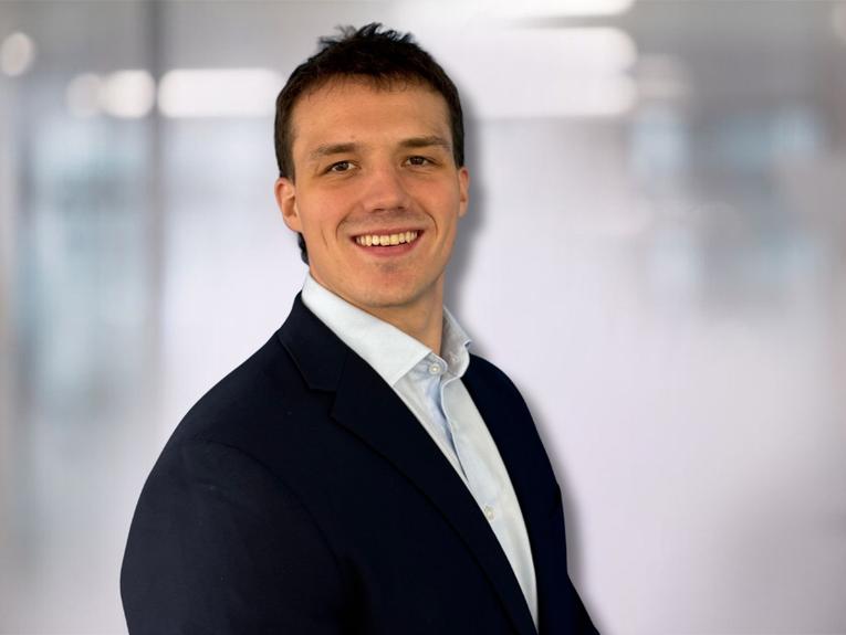 headshot of James Rayner