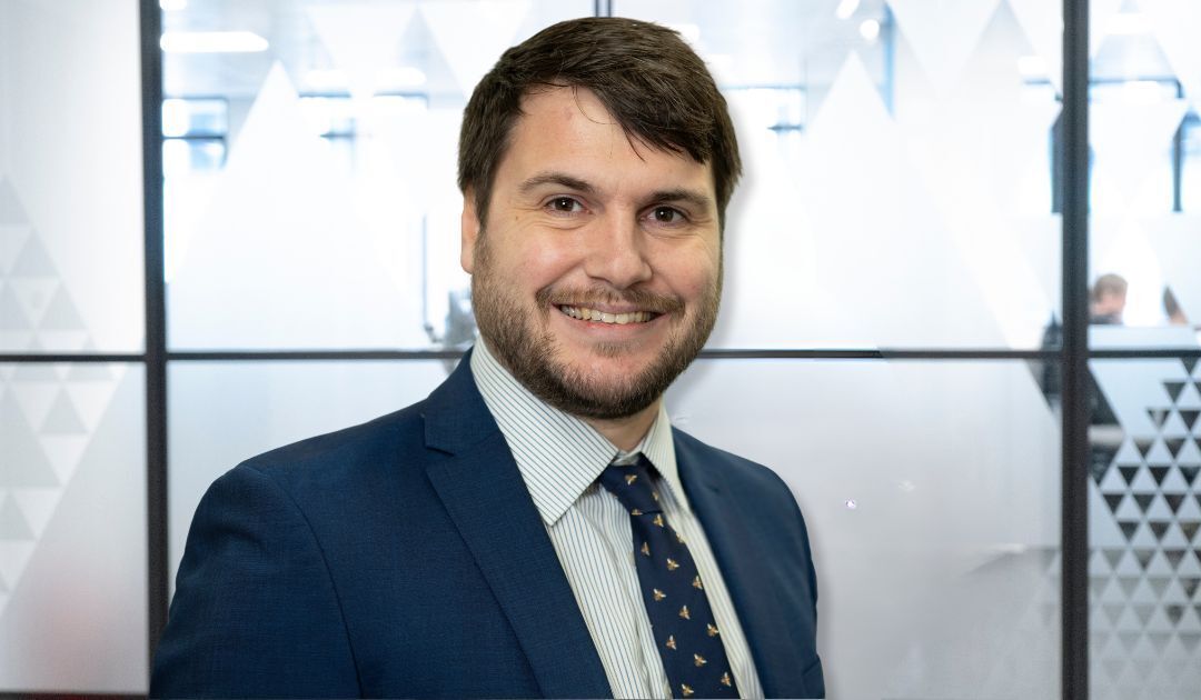 A headshot of Simon Roberts