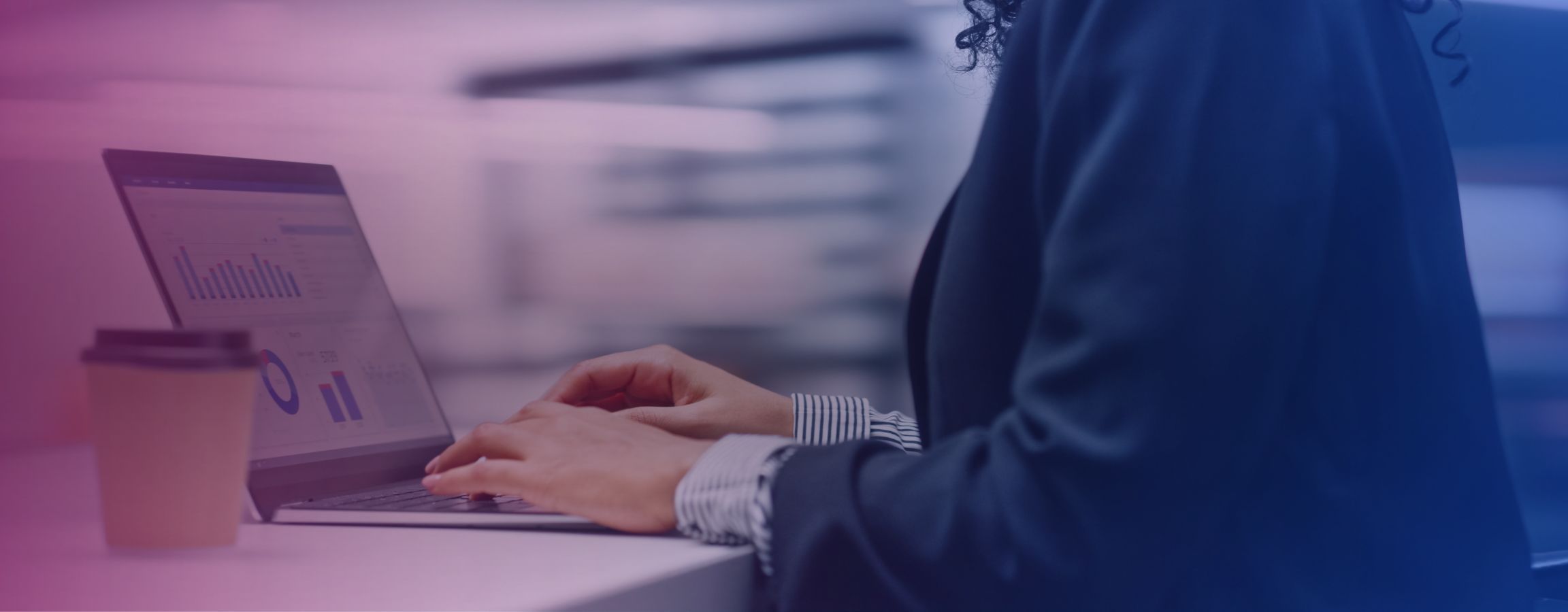 Stock image of an employee working on a computer