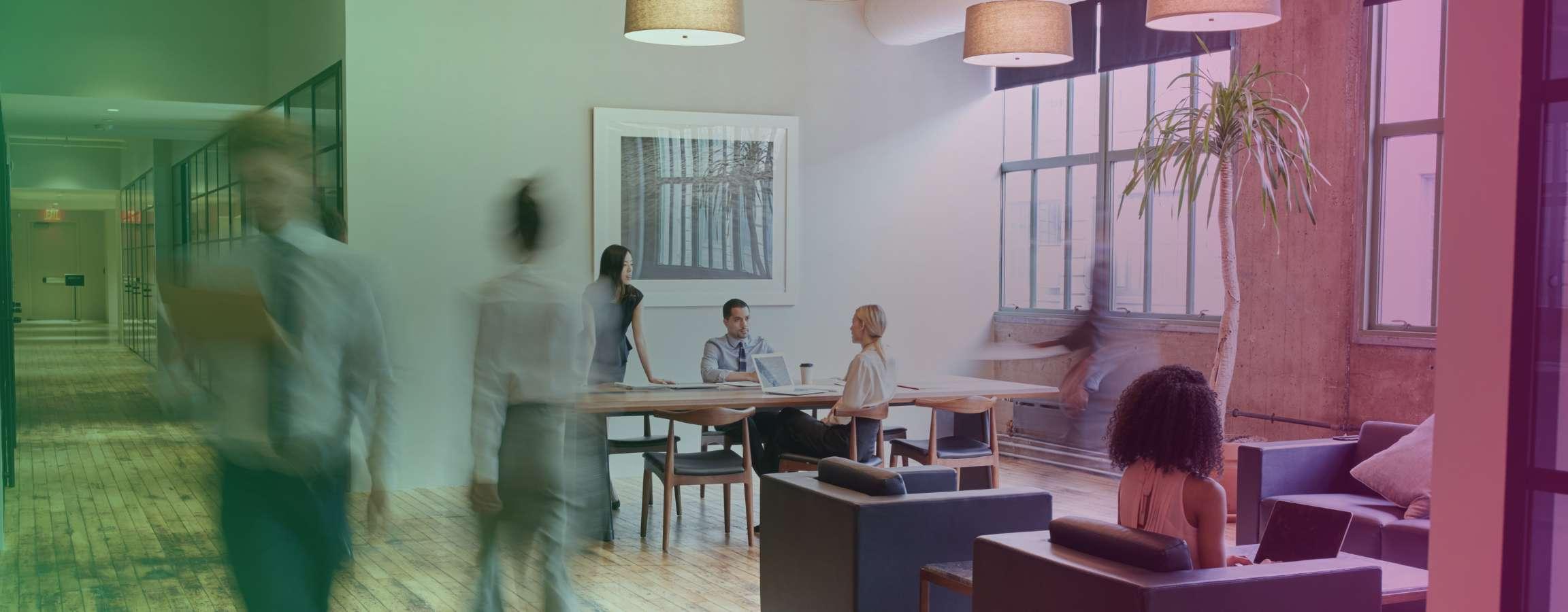 People walking in a busy office