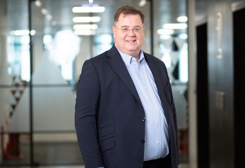 A headshot of Ian Jefferson