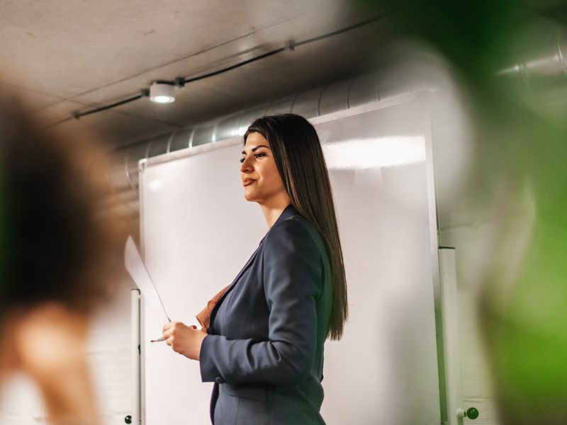 Woman presenting in an office