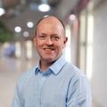 headshot of neil hughes