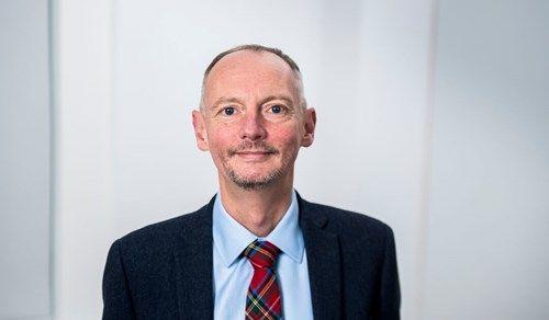 A headshot of Graham Rigby