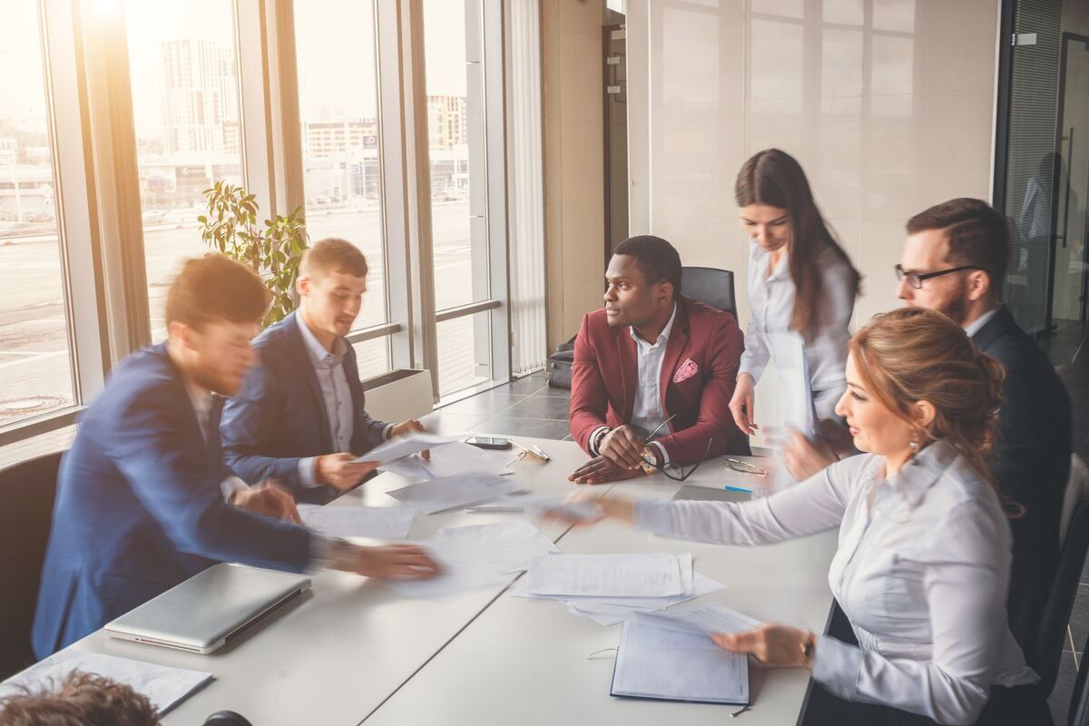 Group of people around a conference table