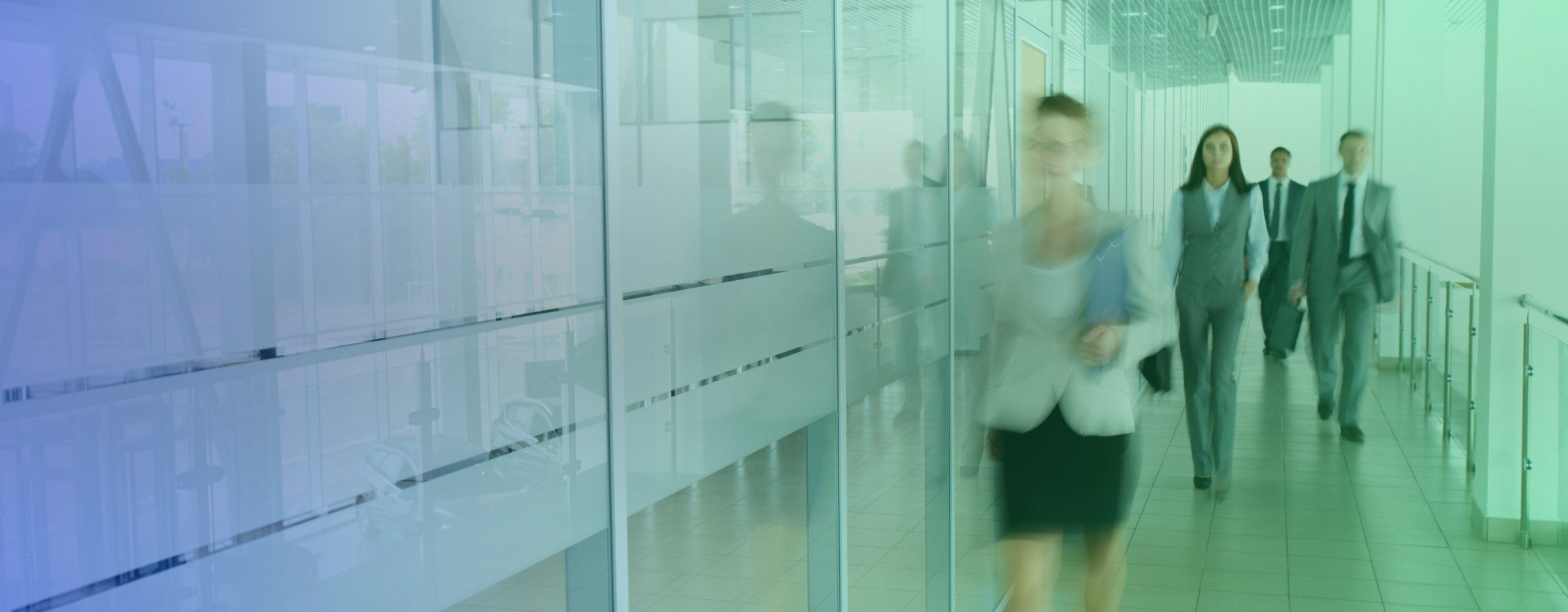 Employees walking down a corridor