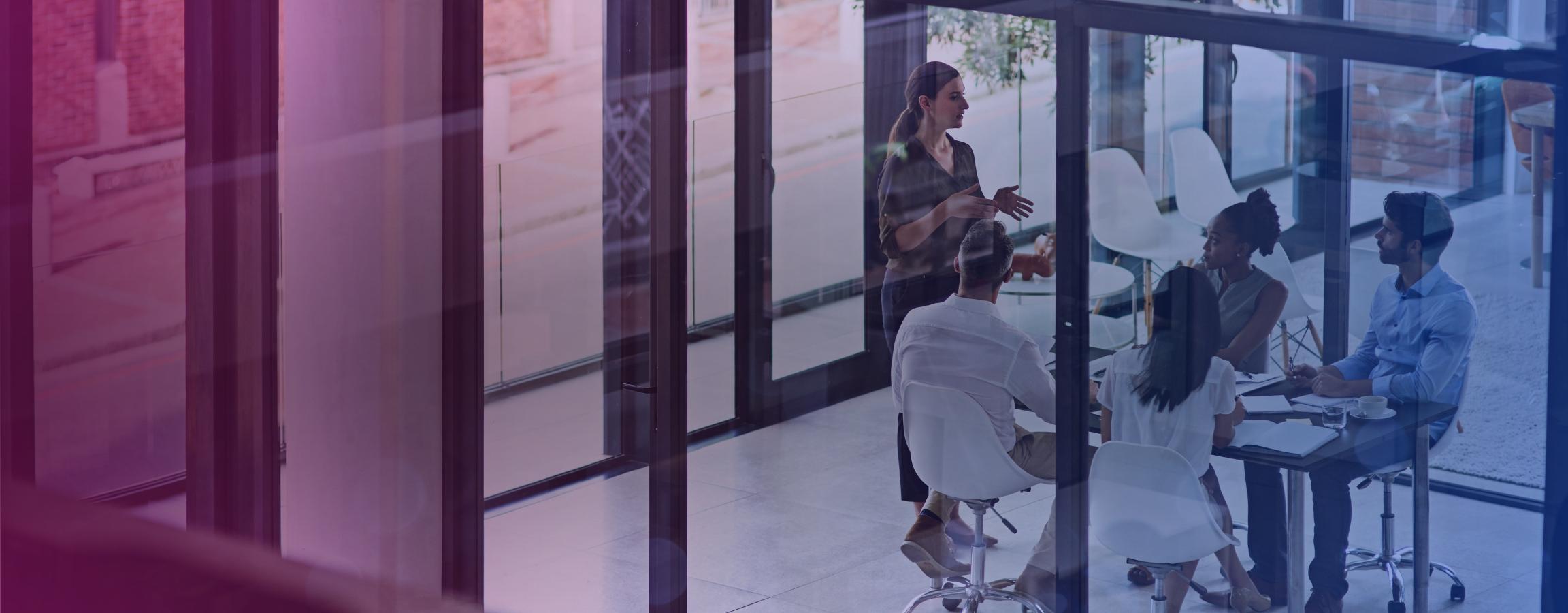 corporate stock image of employees in a meeting