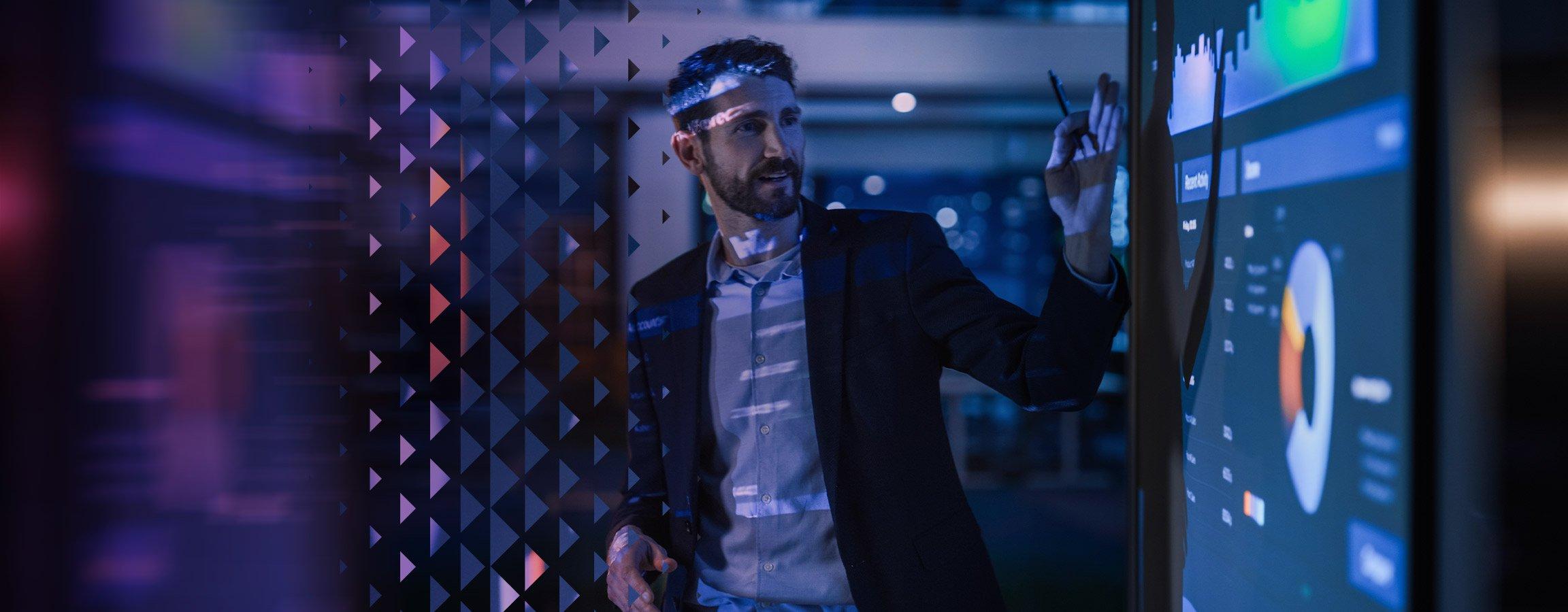 Mies esittelee graafeja