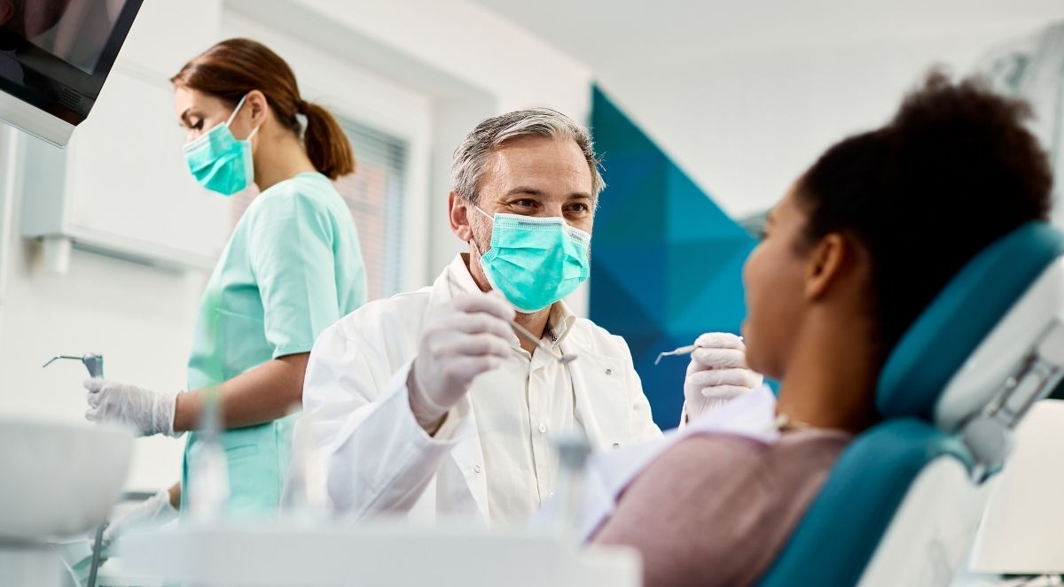 A woman being examined by the dentist