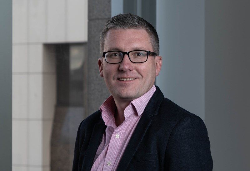 A headshot of James Wheeler