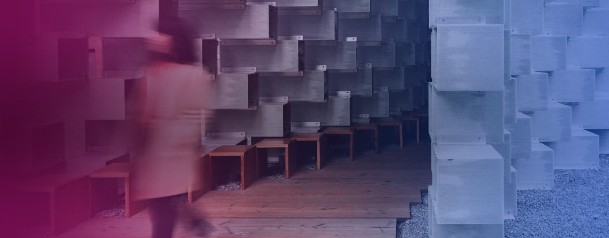 A person walking past a building