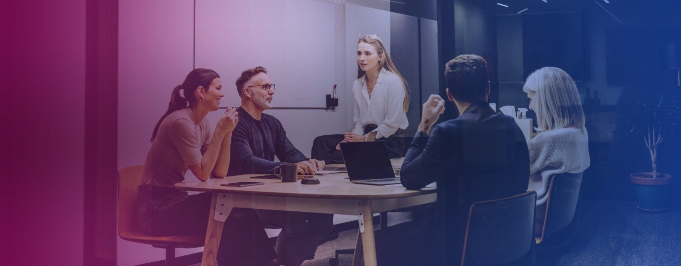Employees sat at a table