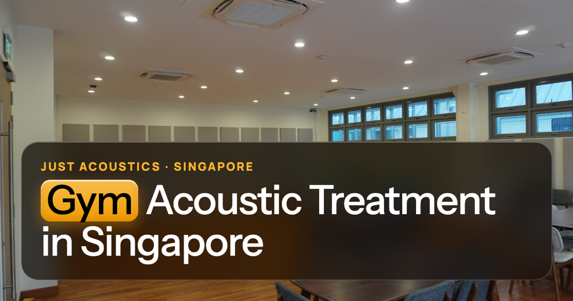 Large hall with acoustic panels on the walls under a high ceiling