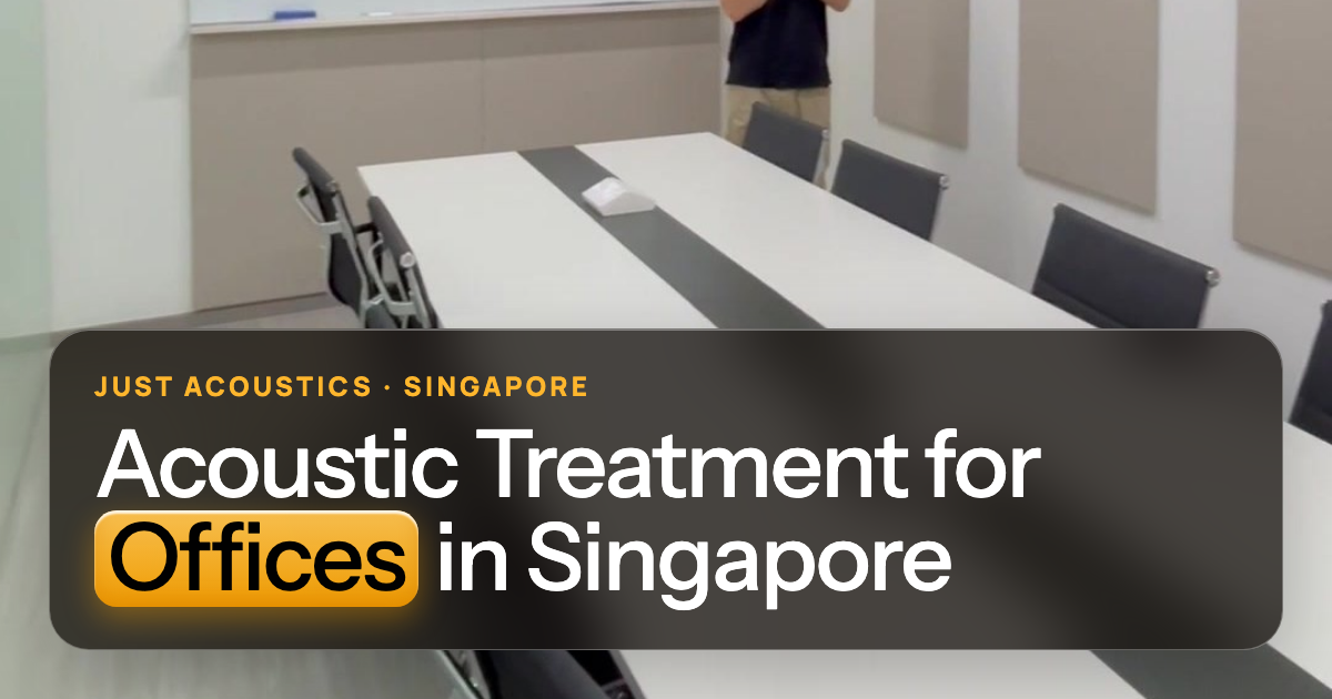 Office meeting room in Singapore with acoustic wall panels and a long table